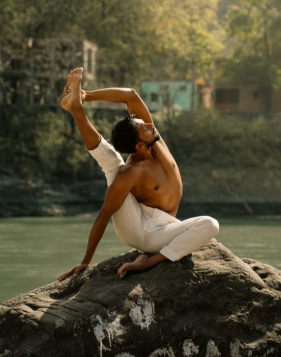 An Advanced yoga posture during yoga intensive workshop